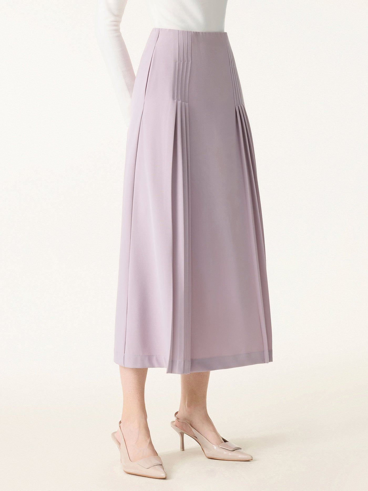 Şık ve Rahat Cepli Düz Dökümlü Midi Pilili Etek