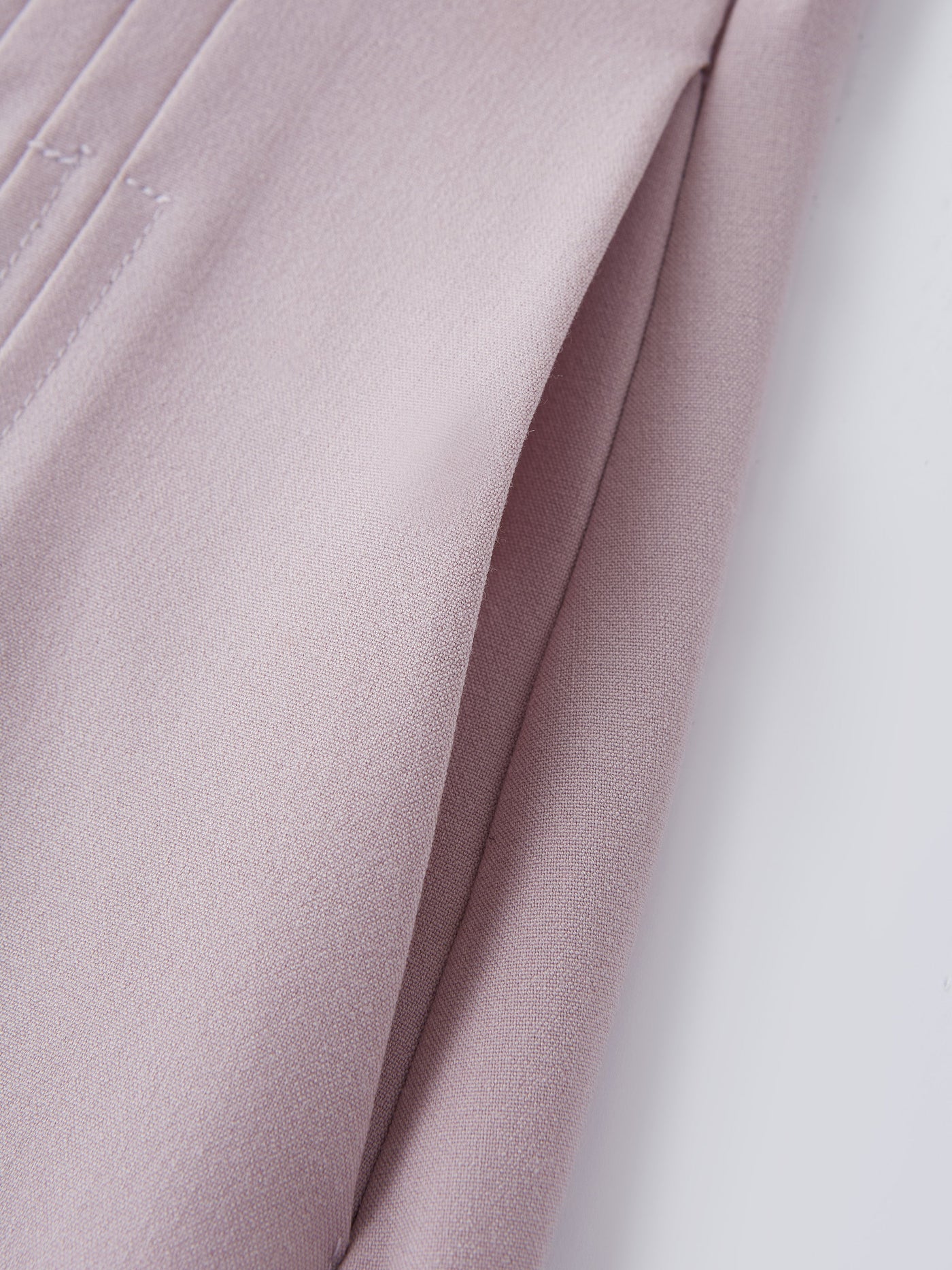 Şık ve Rahat Cepli Düz Dökümlü Midi Pilili Etek