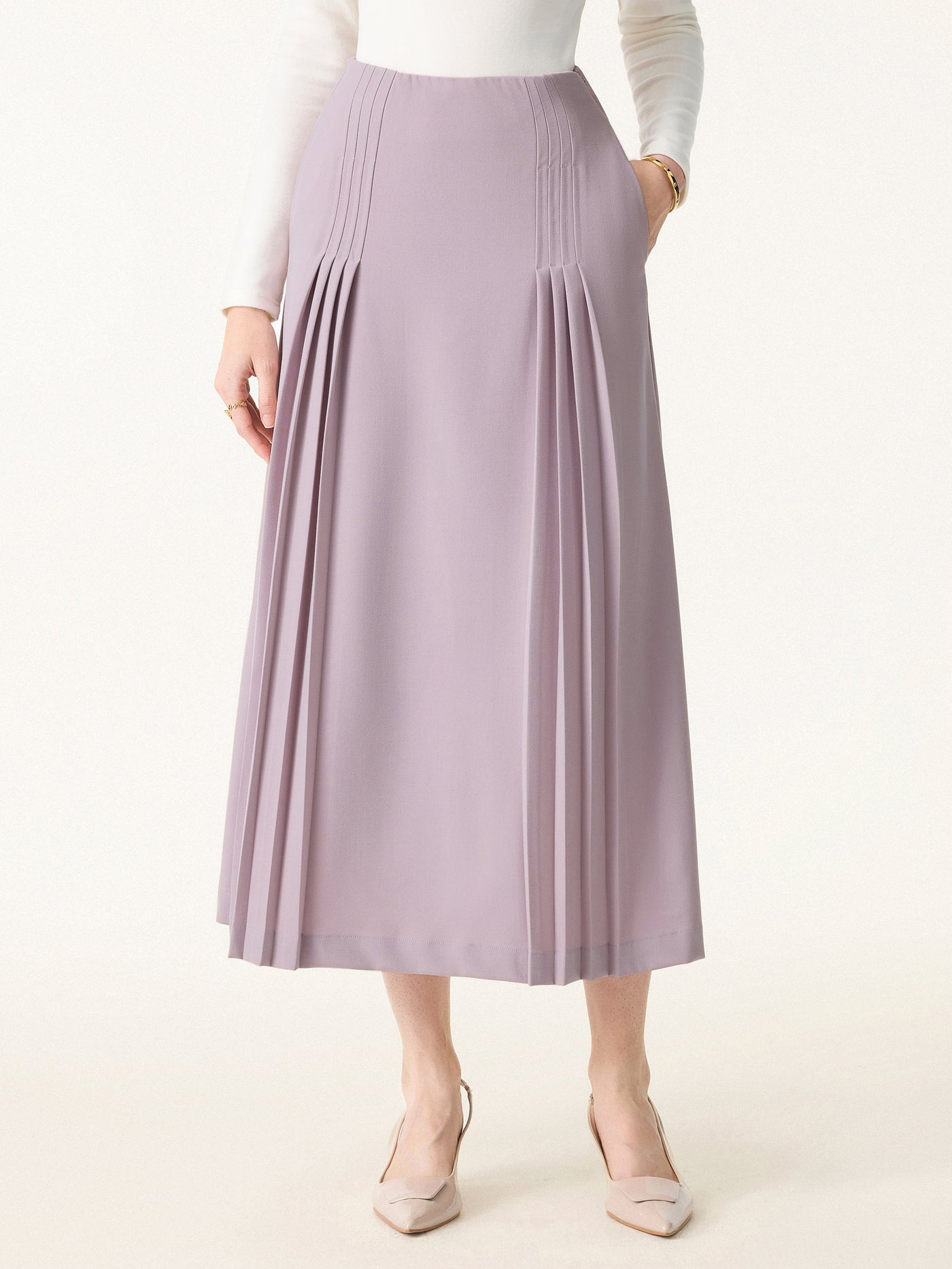 Şık ve Rahat Cepli Düz Dökümlü Midi Pilili Etek